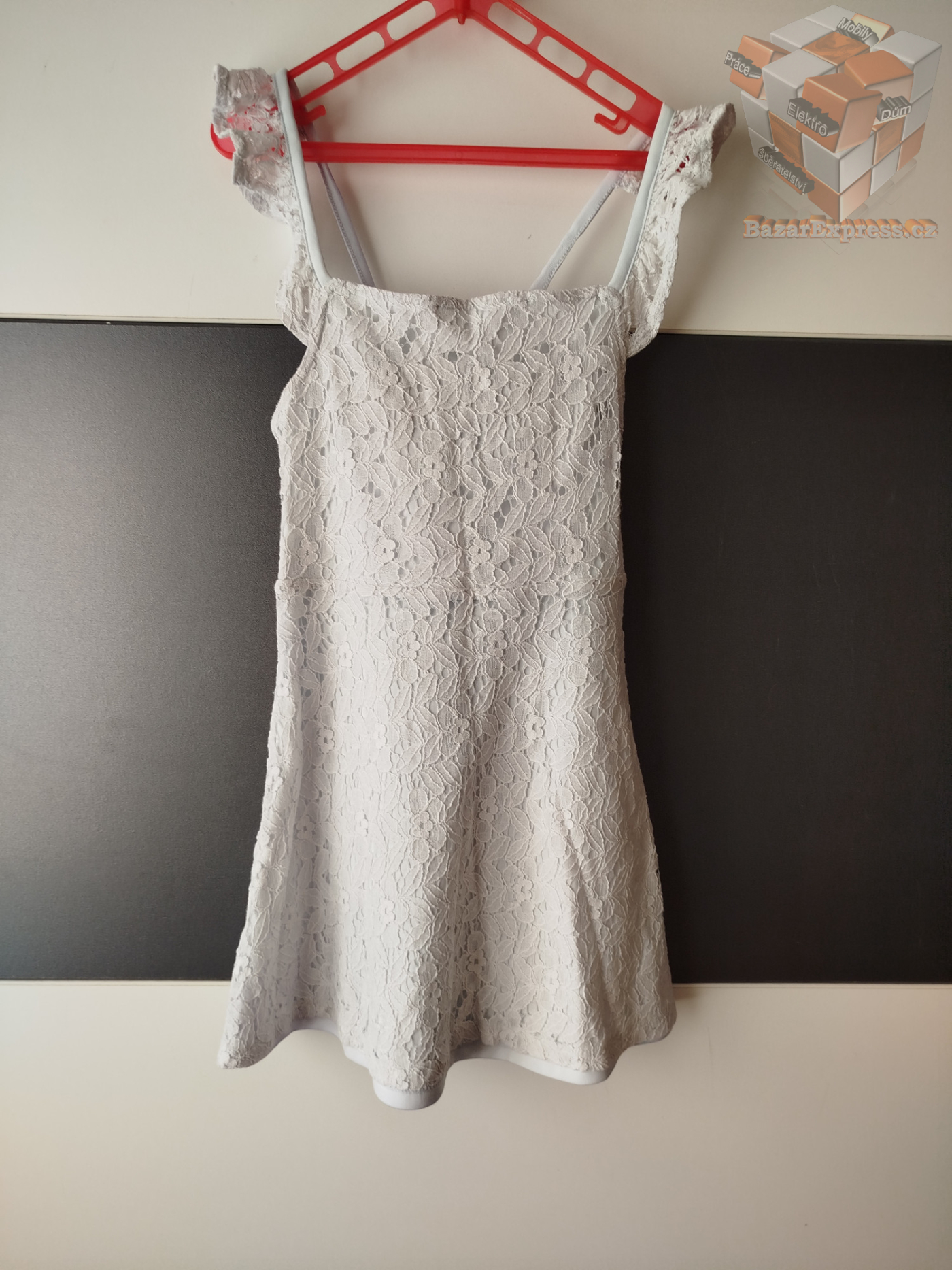 Šaty zn. H&M vel.122