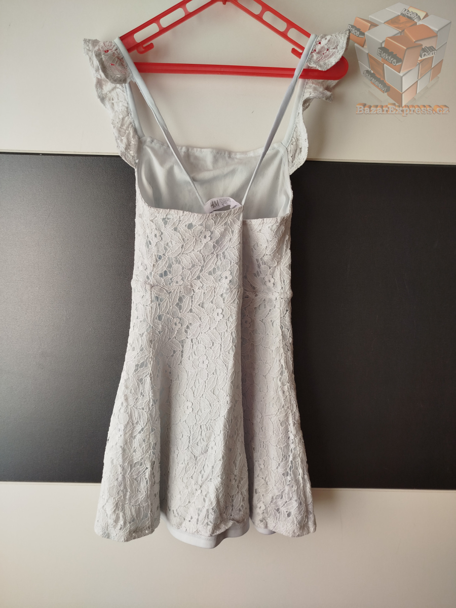 Šaty zn. H&M vel.122