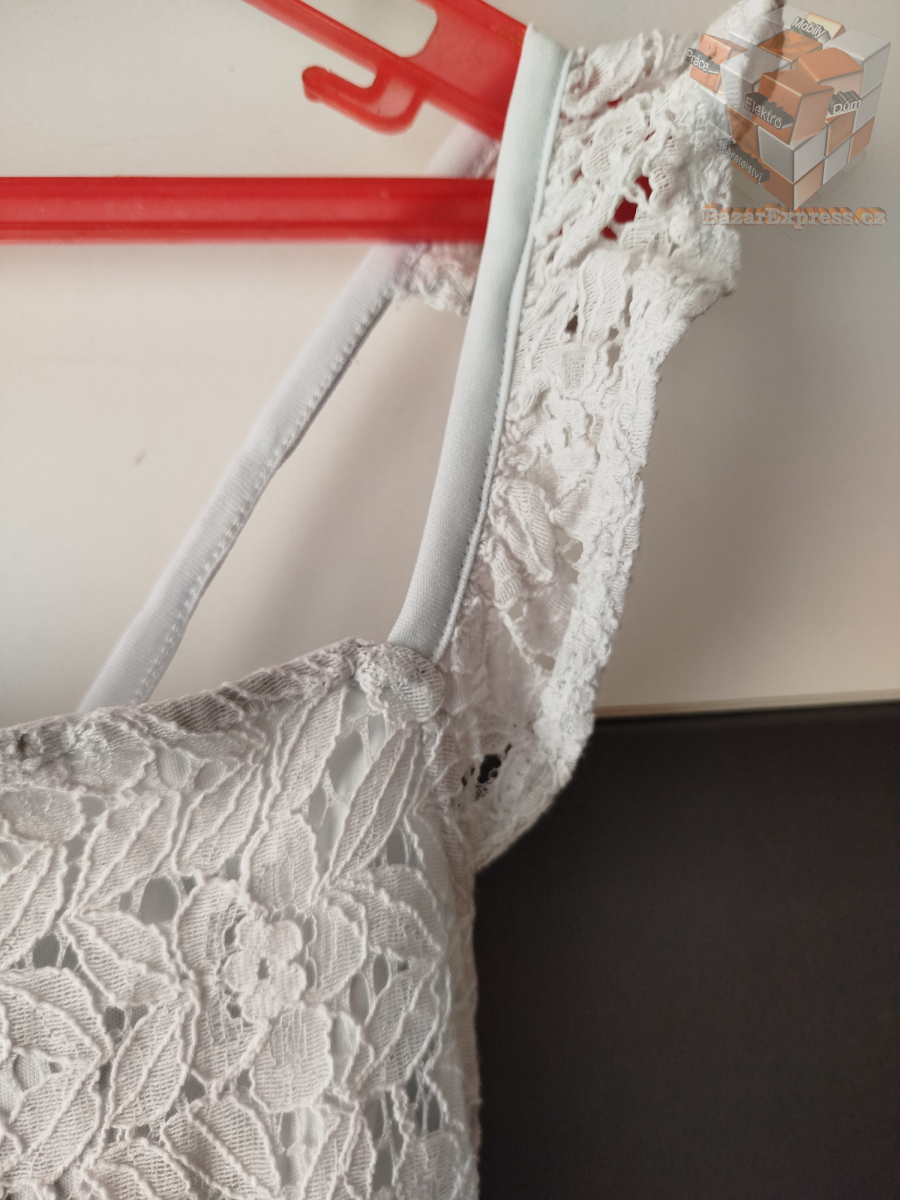 Šaty zn. H&M vel.122