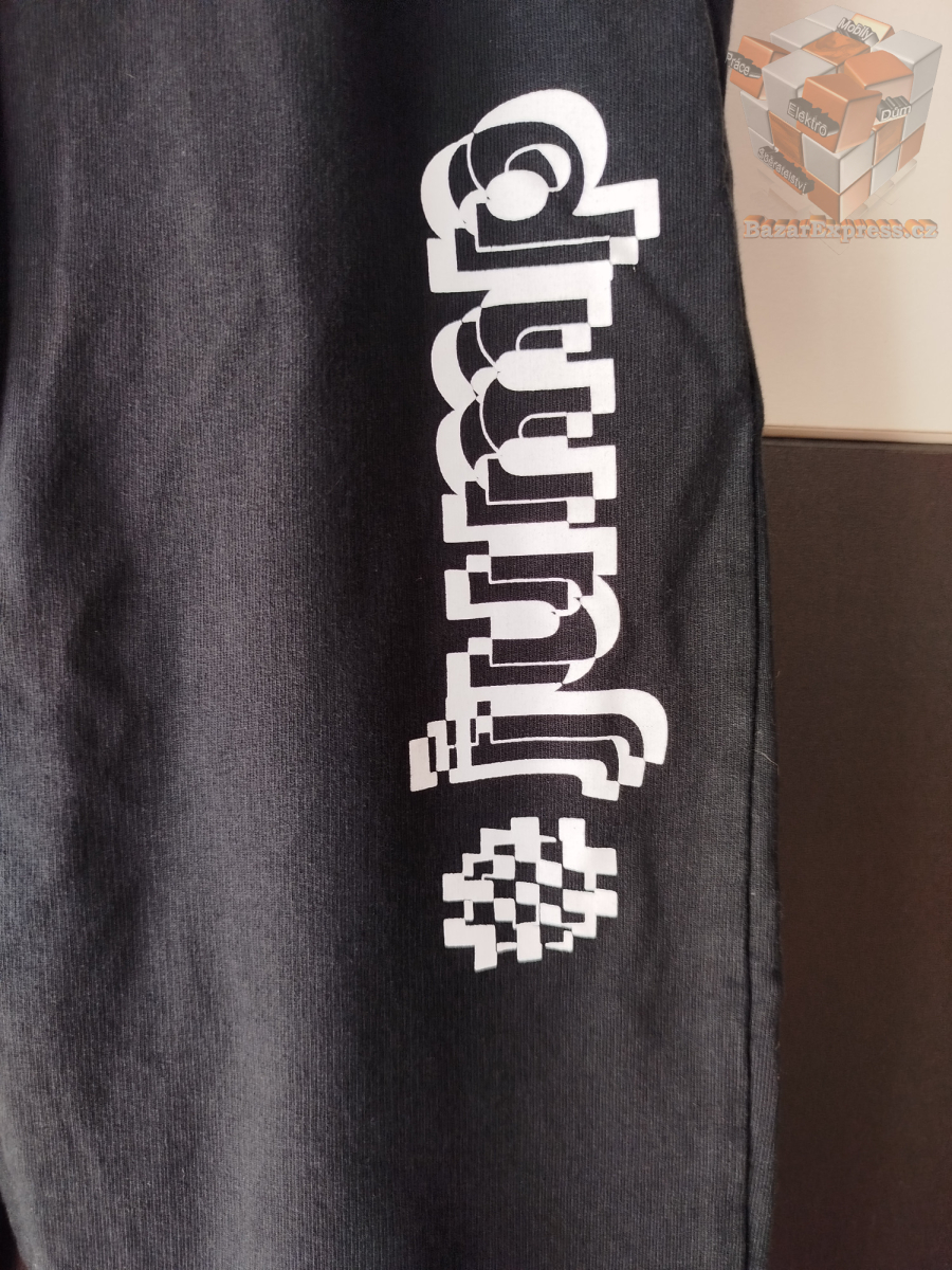 Tepláky zn. Mokida vel.134